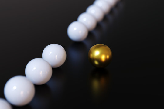 Golden and white balls on a balck background, illustration of the concept of leadership.3d rendering