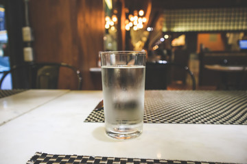 Glass of water on restaurant table
