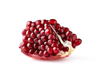 Cut the pomegranate   isolated on white background.