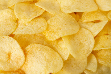 crispy potato chips snack texture background top view