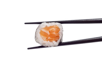japanese salmon maki sushi roll with chopsticks isolated on white background with clipping path