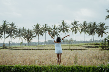 woman in white enjoy in rice field terrace