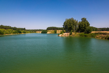 Fototapeta na wymiar Lake (former gravel pit) in Slopsk near Wyszkow, Masovia, Poland
