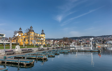 Fototapeta na wymiar View of the waterfront in village Velden at Worthersee, Austria