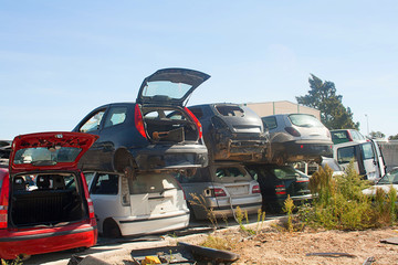 A graveyard of cars, broken cars sell on spare parts.