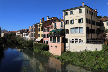 Fototapeta na wymiar Houses along the Brenta river in Padua, Italy