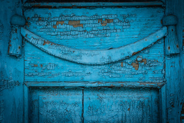 Door decoration on old wooden blue door.
