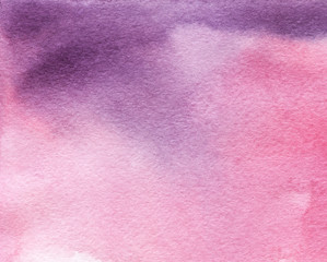 Colorful abstract watercolor background. Pink, lilac, violet sunset. Hand drawn on a wet textured paper.