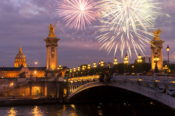 famouse Alexandre III Bridge at violet night with fireworks, Paris, France