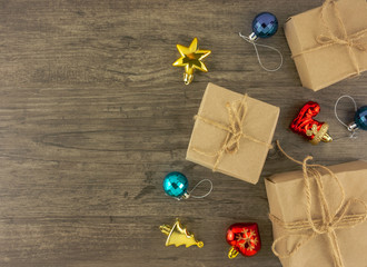 Flat lay,top view Christmas ornaments on wooden background with copy space