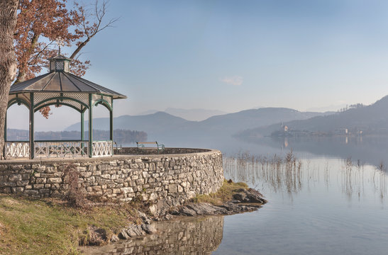 Pavilion on the shore of Worthersee with Maria Worth in background, Austria