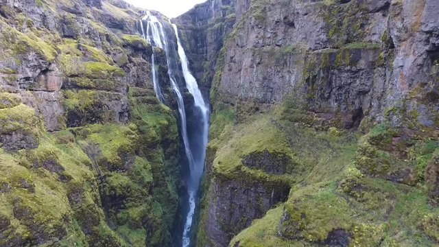 Glymur waterfall in Iceland aerial shot. 
