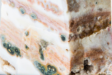 Semi-precious stones and minerals on a white background