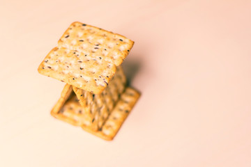 Stacked cereal biscuits (integral) with a light background.