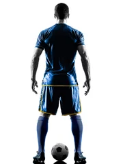 Tuinposter one caucasian soccer player man standing Rear View in silhouette isolated on white background © snaptitude