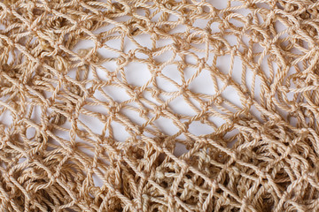 Fishnet on white background. Fishing net. Texture fishnet, seine. Dragnet, drag, trammel, sweep-net