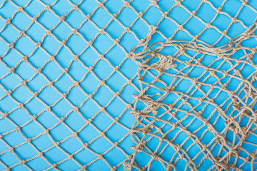 Fishing net  over blue background 