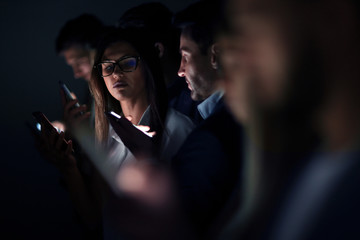 close up.image of colleagues with gadgets