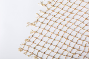 Fishnet on white background. Fishing net. Texture fishnet, seine. Dragnet, drag, trammel, sweep-net - obrazy, fototapety, plakaty