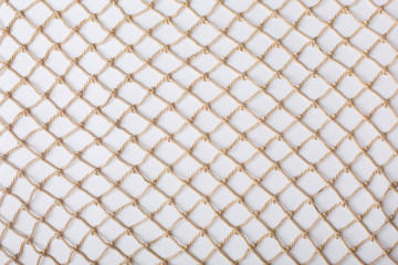 Fishnet on white background. Fishing net. Texture fishnet, seine. Dragnet, drag, trammel, sweep-net