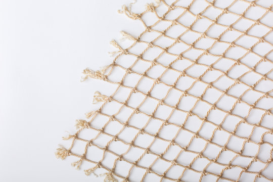 Fishnet on white background. Fishing net. Texture fishnet, seine. Dragnet, drag, trammel, sweep-net