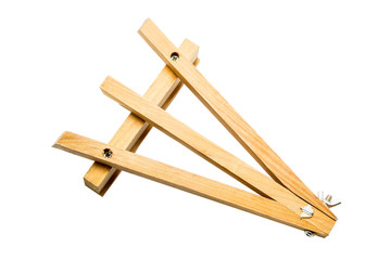 Wooden easel on white background