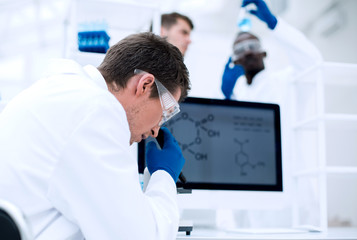 Fototapeta premium close up. the scientist works with a microscope