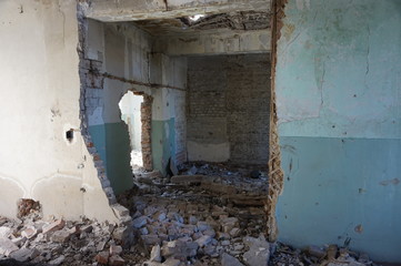 An old, crumbling building from the inside.