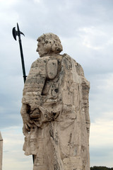 Fototapeta na wymiar Statues on the Papal Basilica St Peter, Vatican