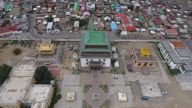 Aerial drone shot of Gandantegchinlen Monasteryin Mongolia Ulanbator Zoom out 