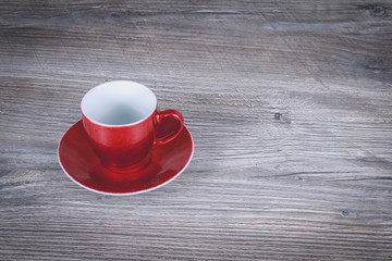 red christmas mug on gray wooden background