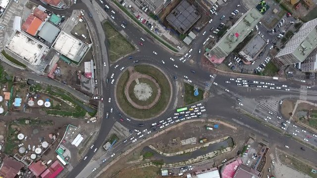 Aerial drone shot roundabout from top view in Ulan Bator Mongolia traffic time