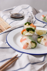 Spring roll with shrimp and sauce on a plate 