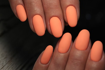 beautiful fashion manicure on a stylish textural background