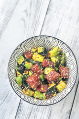Bowl of poke - traditional Hawaiian dish
