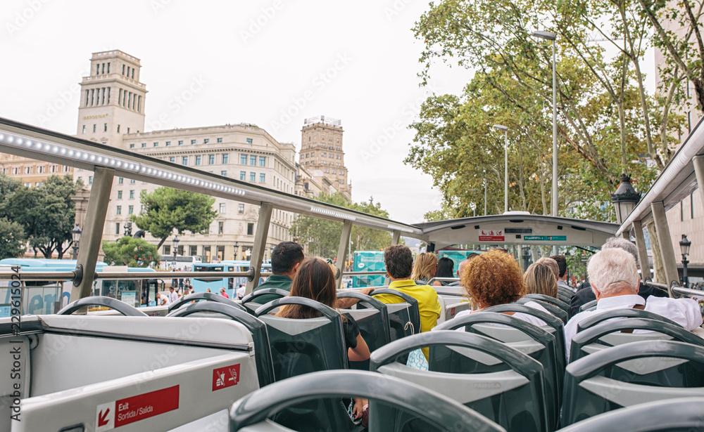 Wall mural tourists in a tourist bus on a sightseeing tour in barcelone