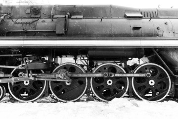 red wheel and detail of mechanism a vintage russian steam train locomotive