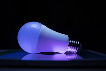 Led lamp shining blue and violet lights, modern techno style