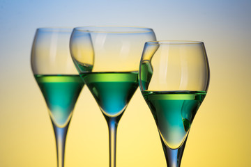 three glasses with cocktails