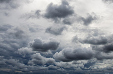 Gloomy, overcast clouds in the sky. Clouds darken before rain