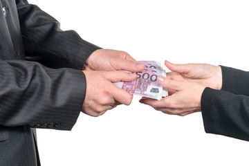 male hands give money to female