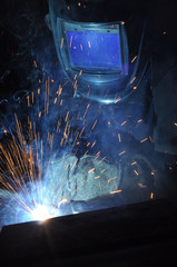 electric welder brews steel at the factory