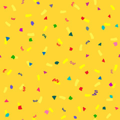 Scattered coloured confetti. Festive seamless pattern. Yellow, red, blue, green, purple.