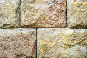 Wall of stone blocks.