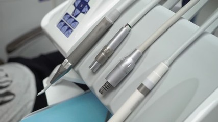 Dental tool equipment in stomatology clinic. Dentist working
