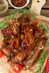 Baked barbecue glazed spare ribs riblets of pork with garlic