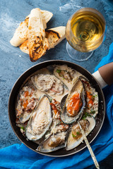 Mussels with Blue Cheese Sauce and Garlic Baguette.