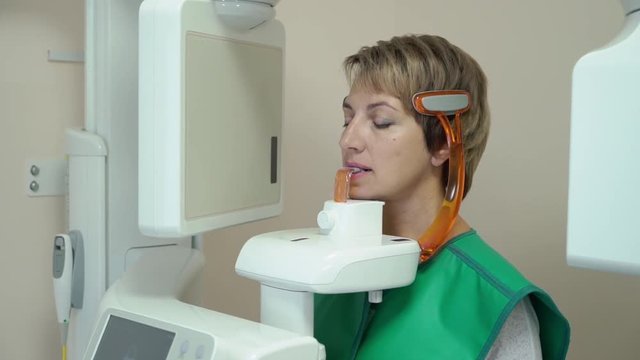 Dental X-Ray Scanner and woman Patient
