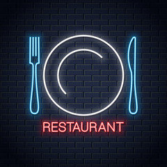 Plate with fork and knife neon sign. Restaurant neon logo on wall background