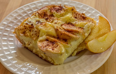 Apple cake with pastry cream and cinnamon